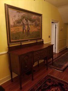 Antique Sideboard under Painting