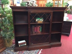 mahogany bookcase with glass door and open sides