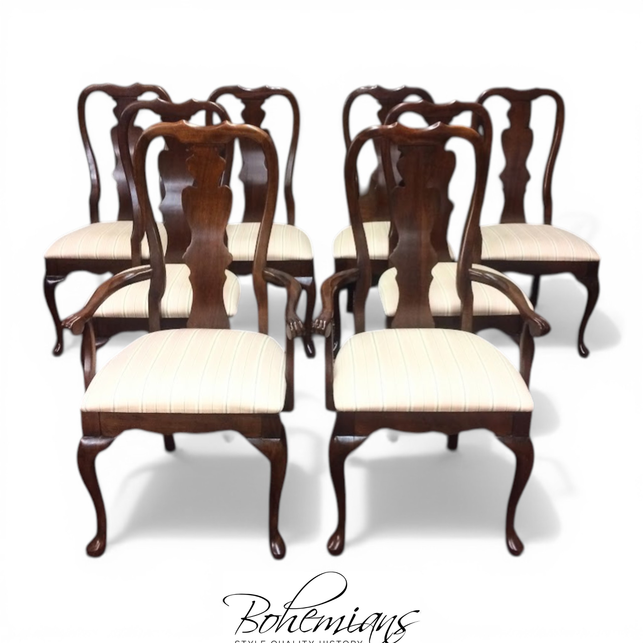 Nice quality vintage dining chairs in solid cherry. These lovely chairs by Jamestown Sterling Furniture come in a set of eight (with two arm chairs).